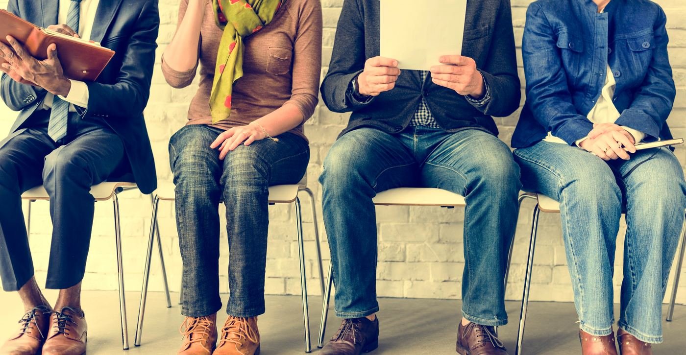Jobseekers waiting in line for an interview